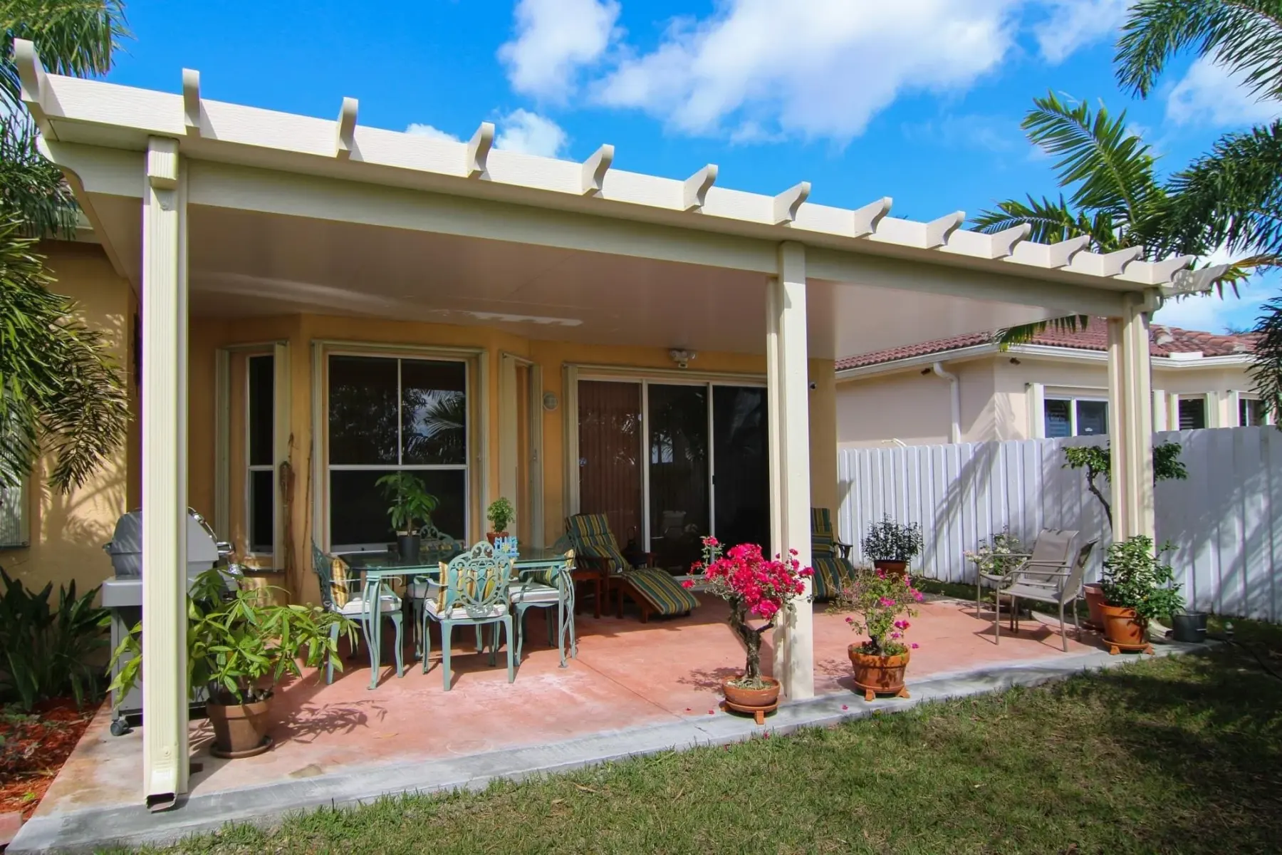 White Naturewood pergola integrated with a residential patio
