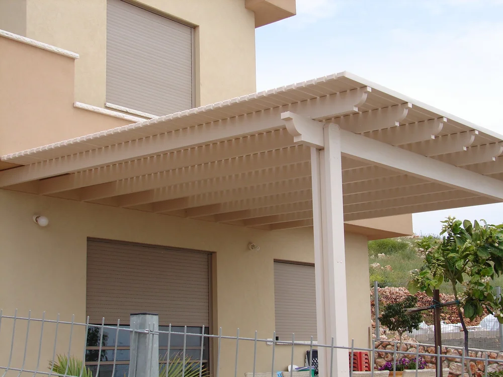 Naturewood pergola creating shade beside a home