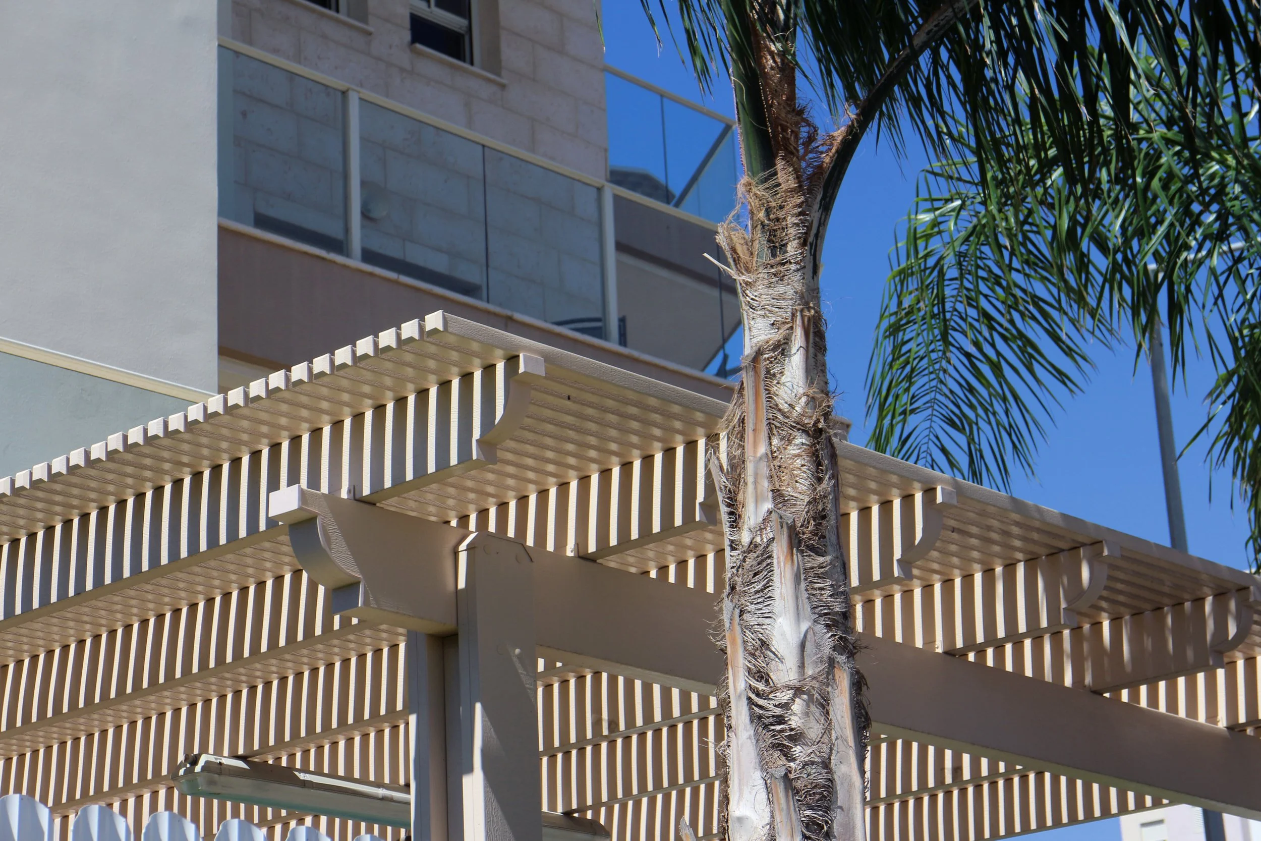 Naturewood pergola integrated with contemporary architecture